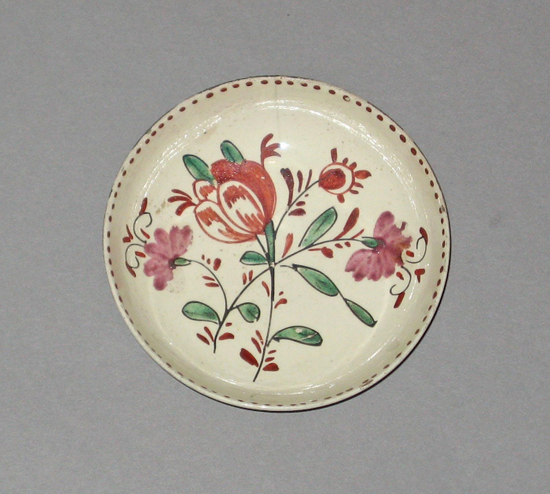 1959.2497 Creamware saucer
