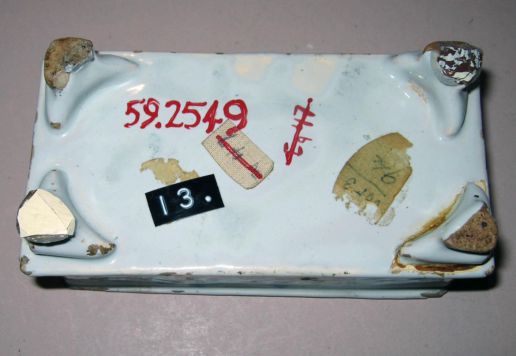 1959.2549 Delftware flower brick (underside)