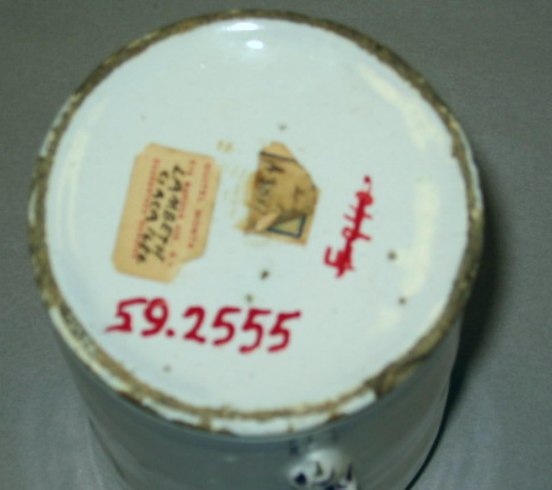 1959.2555 Tin-glazed earthenware mug (underside)