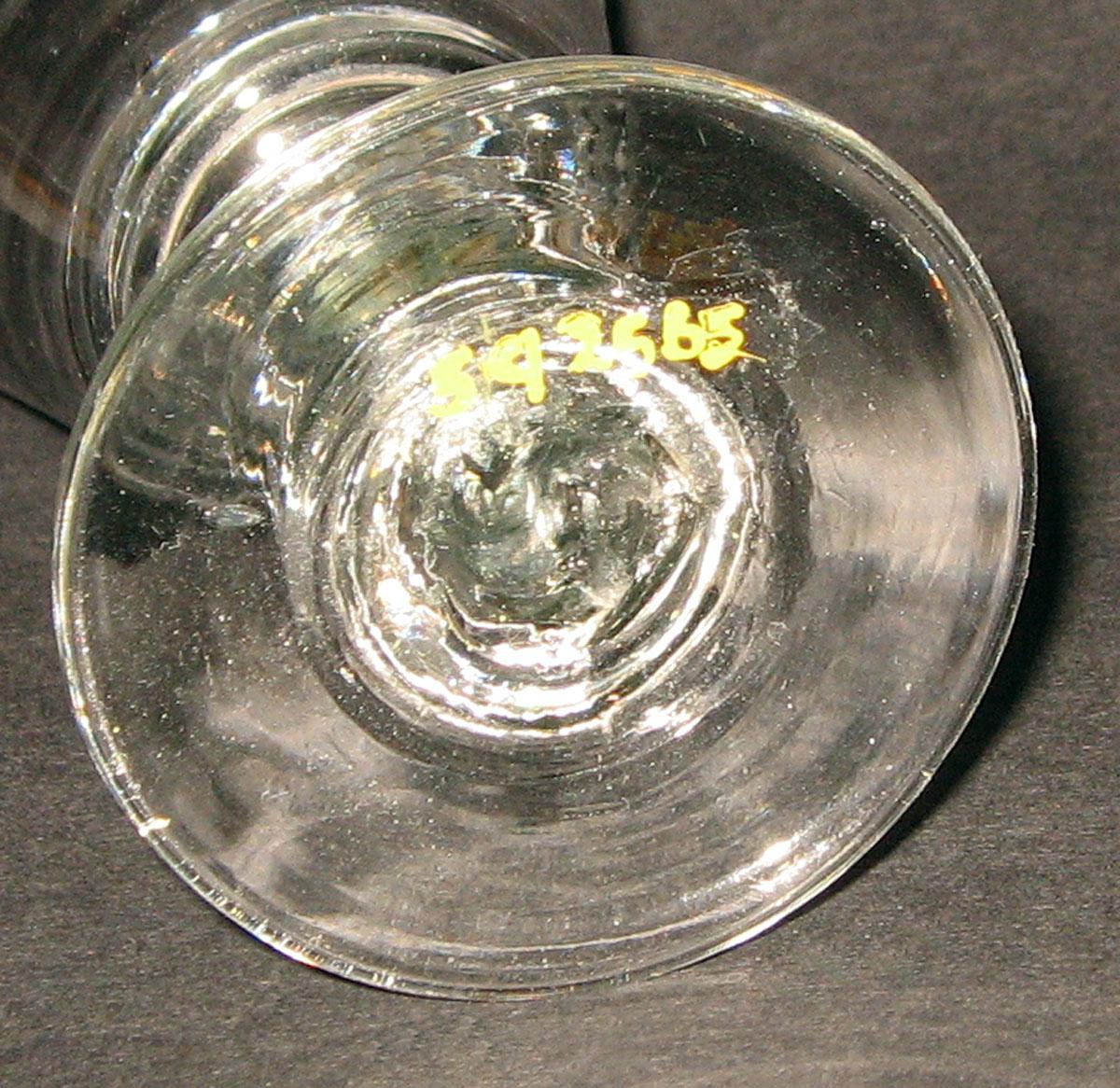 1959.2565 Glass wineglass (underside)