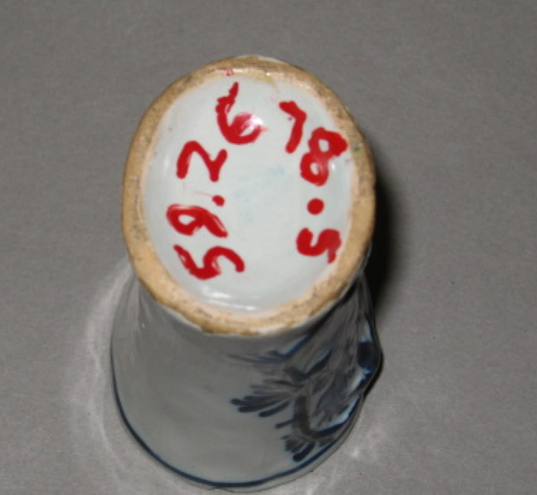 1959.2678.005 Tin-glazed earthenware beaker (underside)
