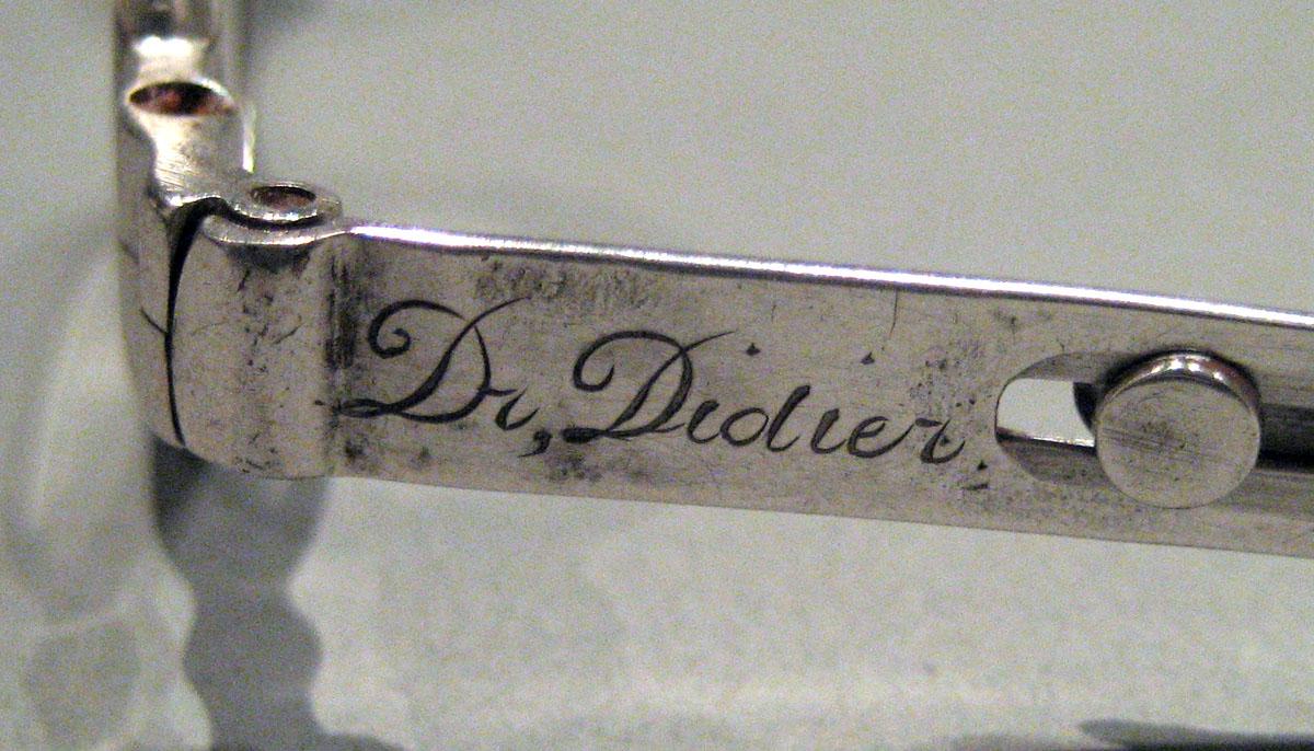 1959.2698 A Silver Spectacles engraving