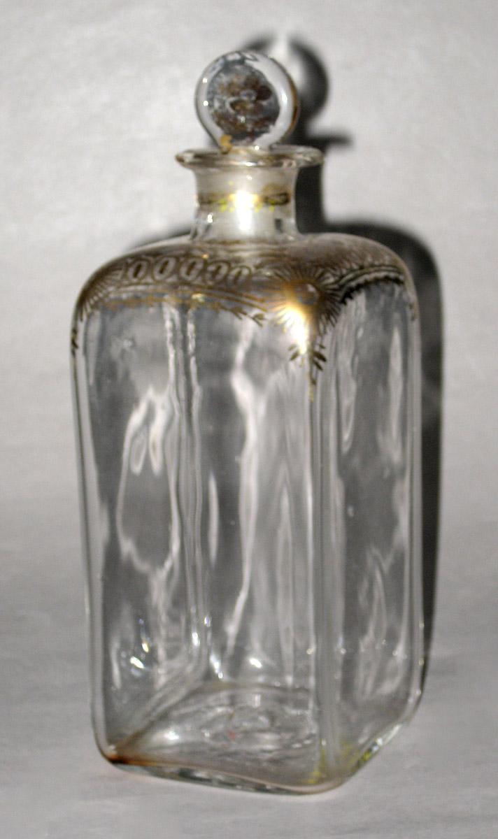1959.2778 G Glass case bottle