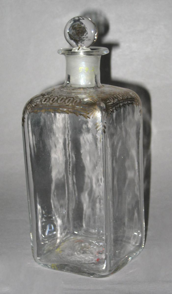 1959.2778 I Glass case bottle