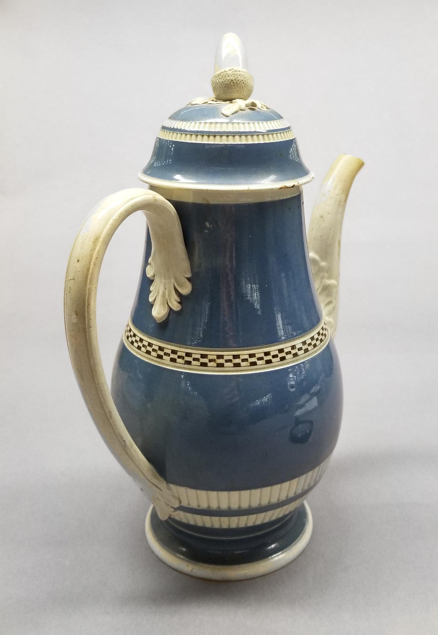 2023.0008.024 A-B Coffeepot handle side