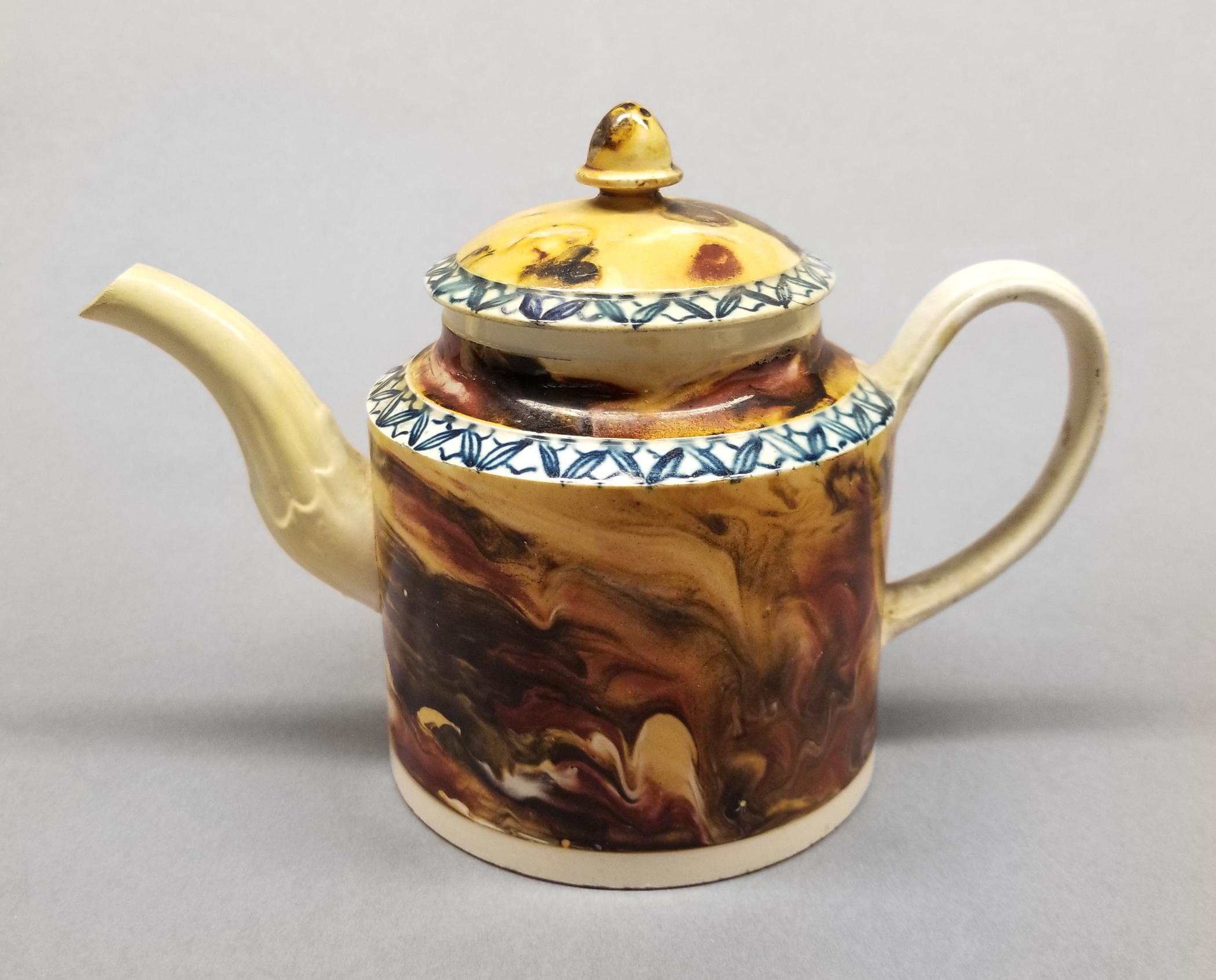 2023.0008.047 A-B Teapot side 1