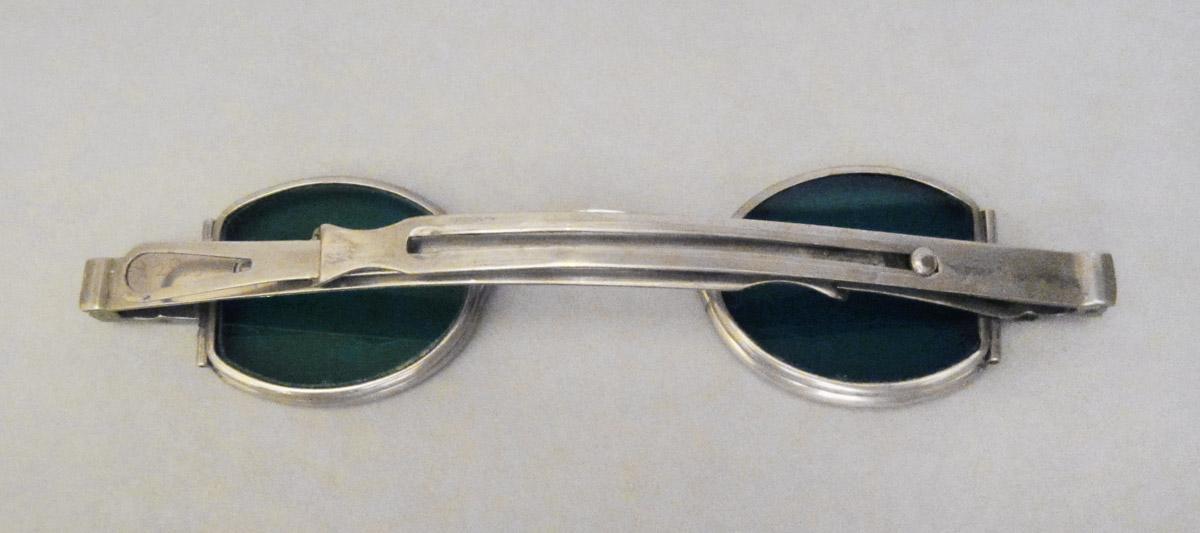 1959.2915 Spectacles, underside