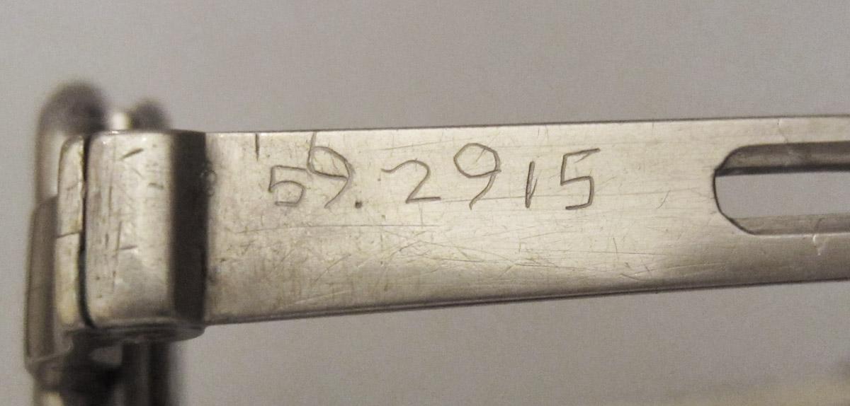 1959.2915 Spectacles, inscription