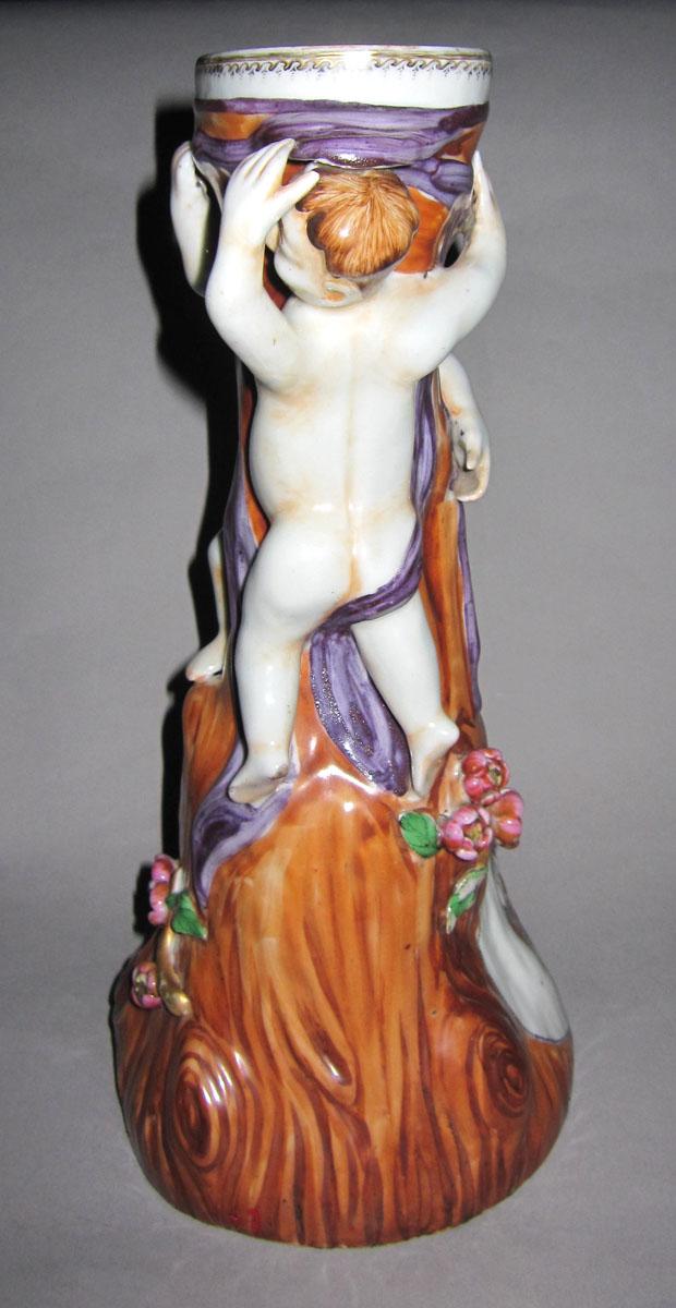 1959.2934 Porcelain fruit stand face four