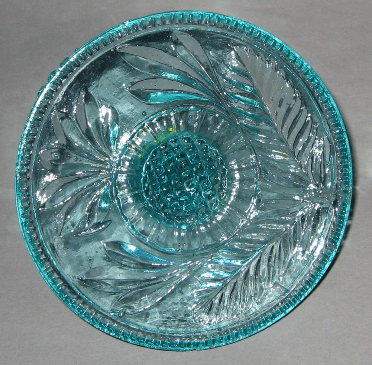 1959.2997 Glass butter mold (detail)