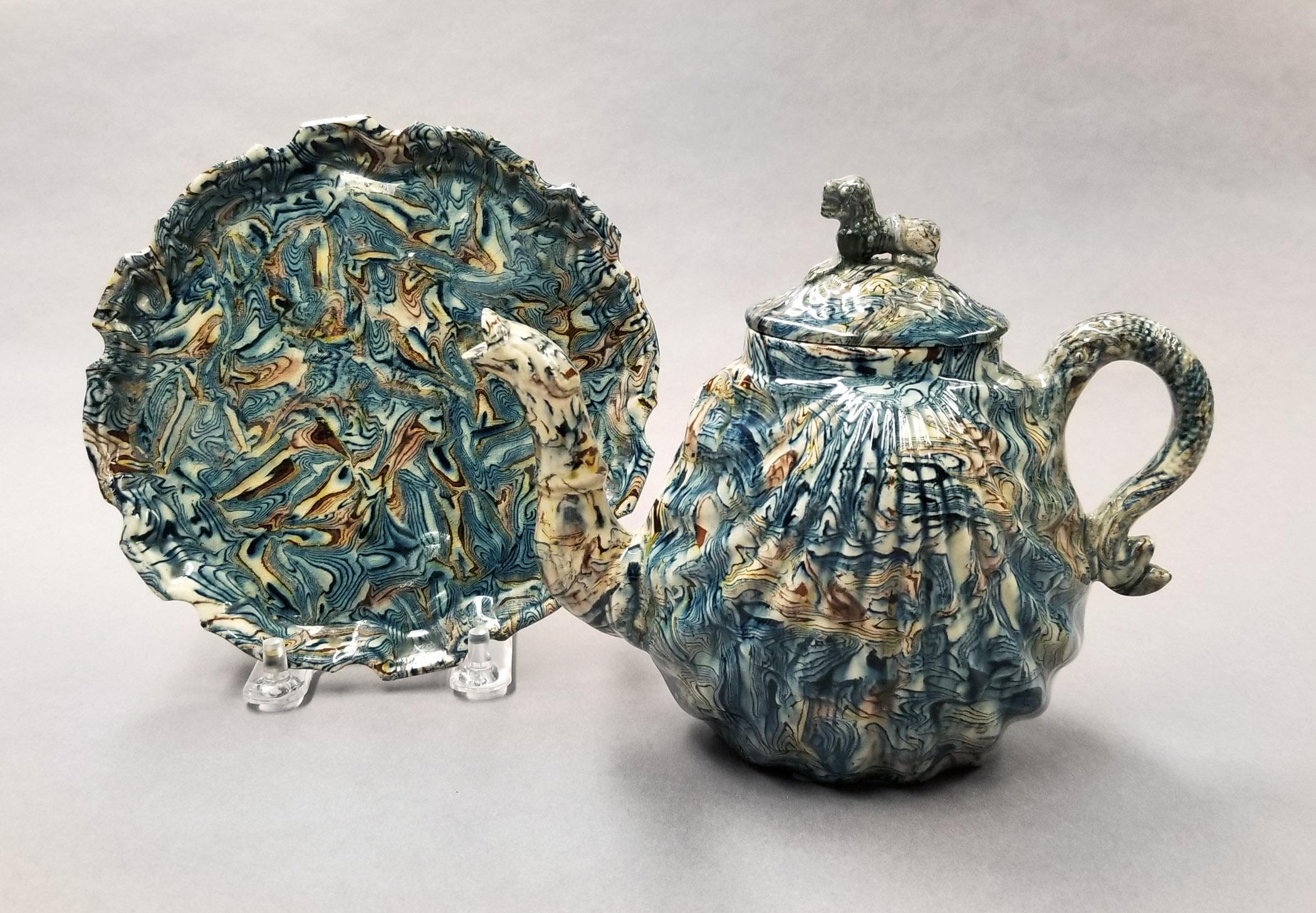 2024.0014.020 and .019 A,B Stand and teapot
