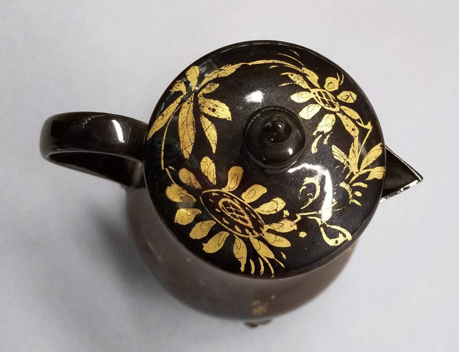 2024.0014.024 A,B  Miilk jug top