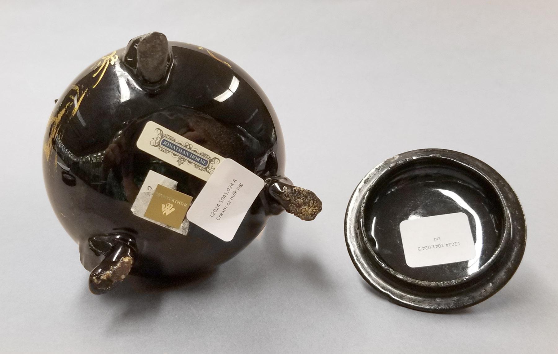 2024.0014.024 A,B  Miilk jug underside