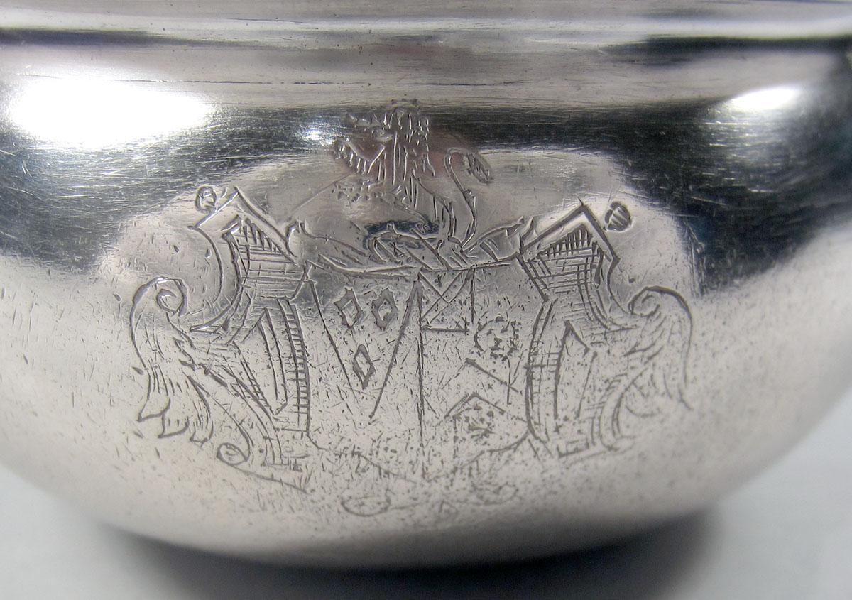 1954.0038 Silver and wood ladle engraved decoration
