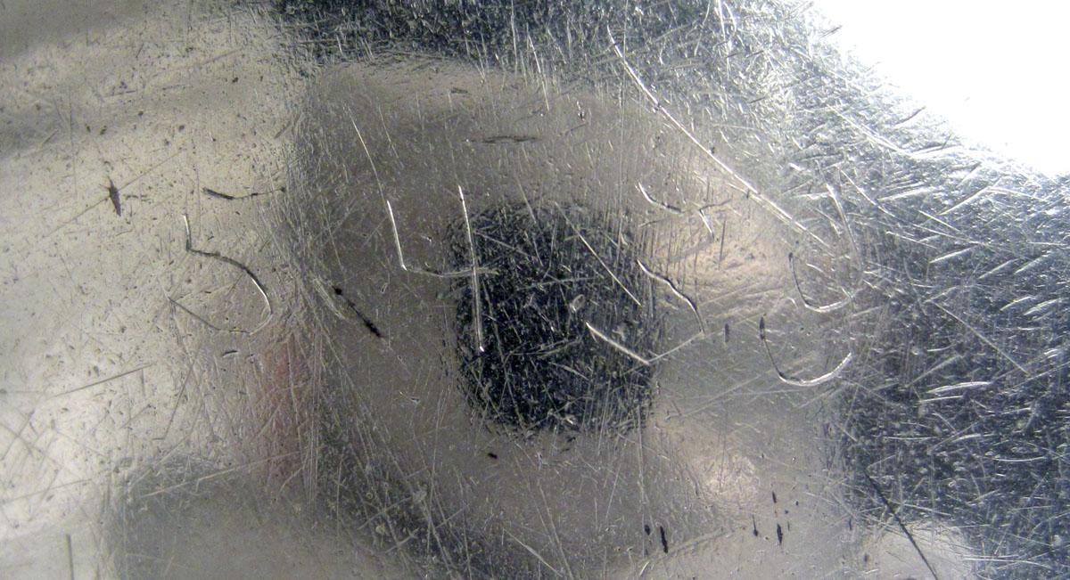 1954.0038 Silver and wood ladle inscription