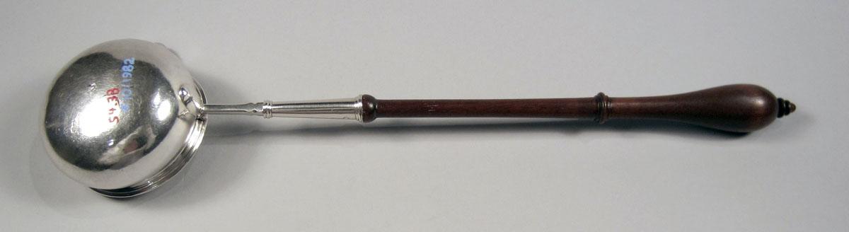 1954.0038 Silver and wood ladle underside