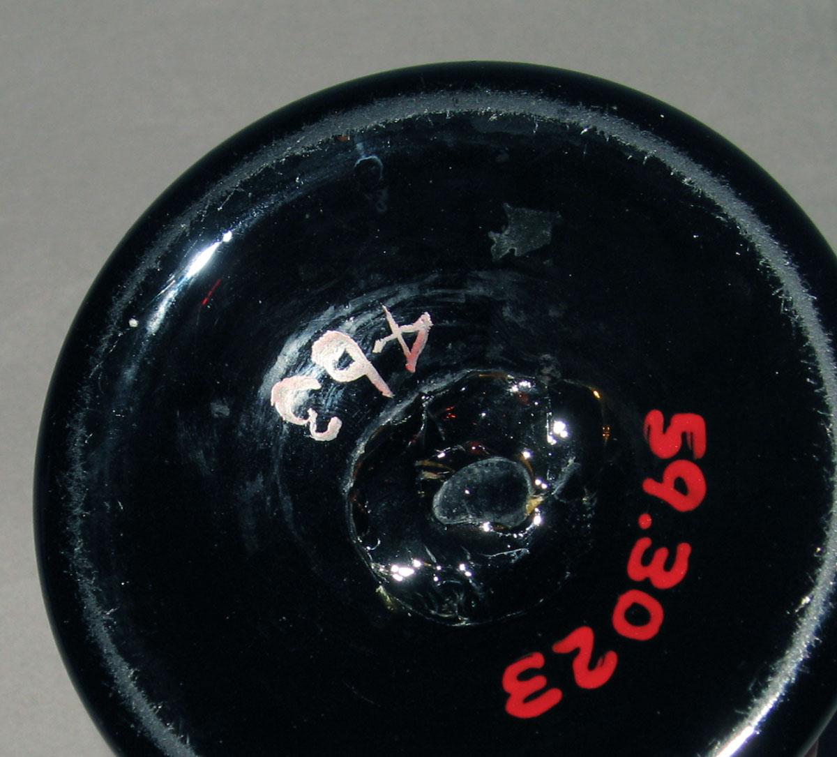 1959.3023 Nonlead glass candlestick (underside)