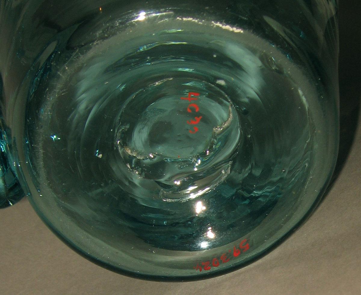 1959.3024 Glass jug (underside)