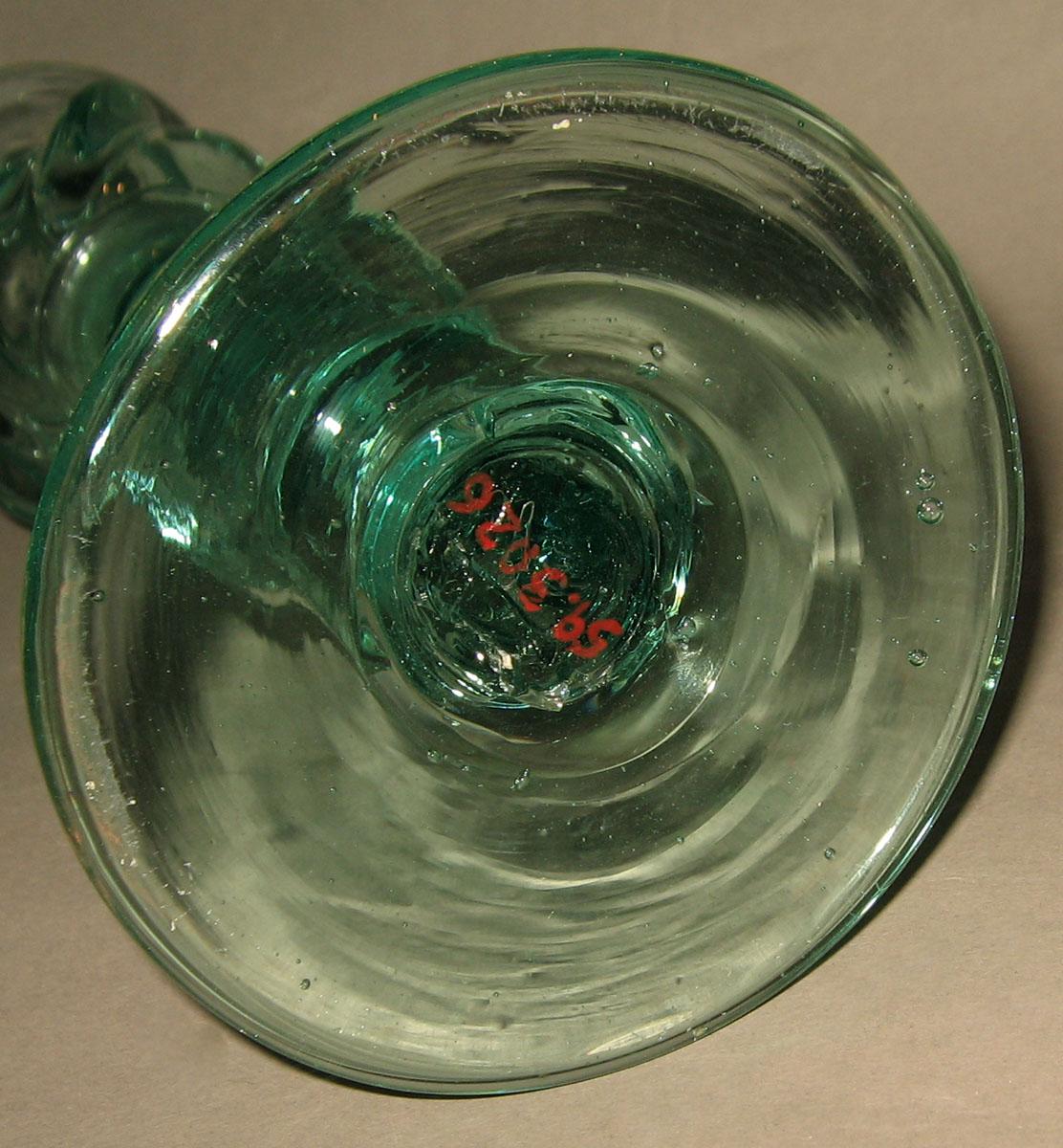 1959.3026 Glass candlestick (underside)