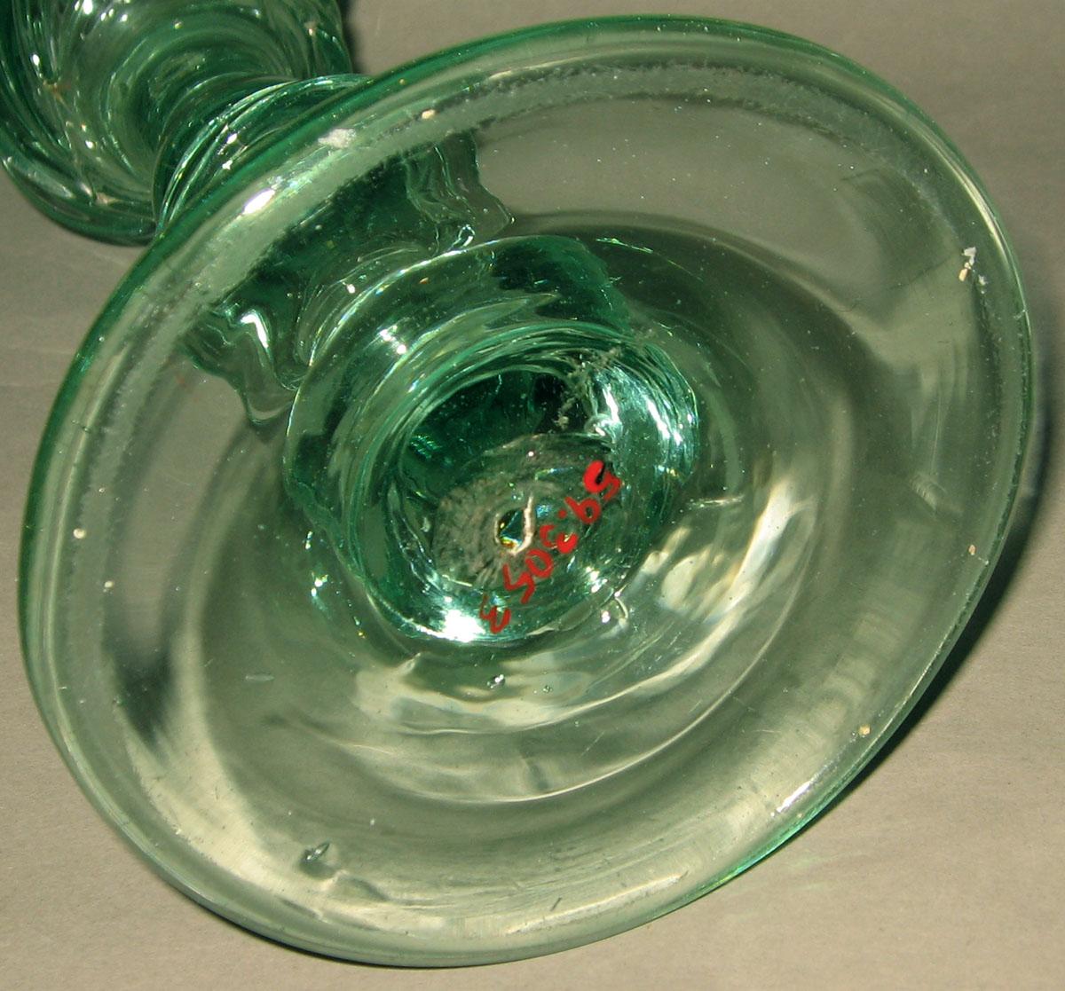 1959.3053 Glass candlestick (underside)