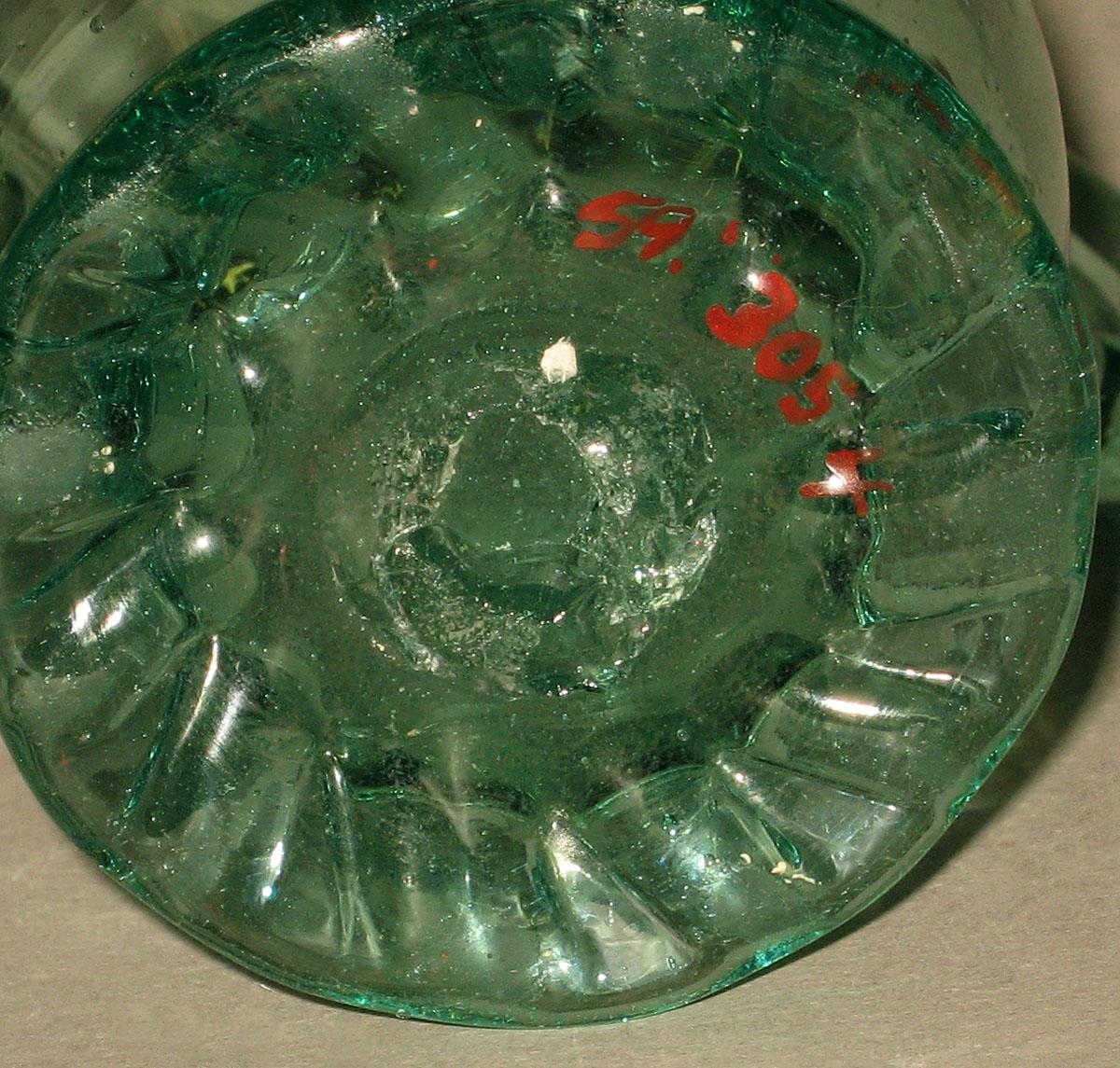 1959.3054 Glass jug (underside)