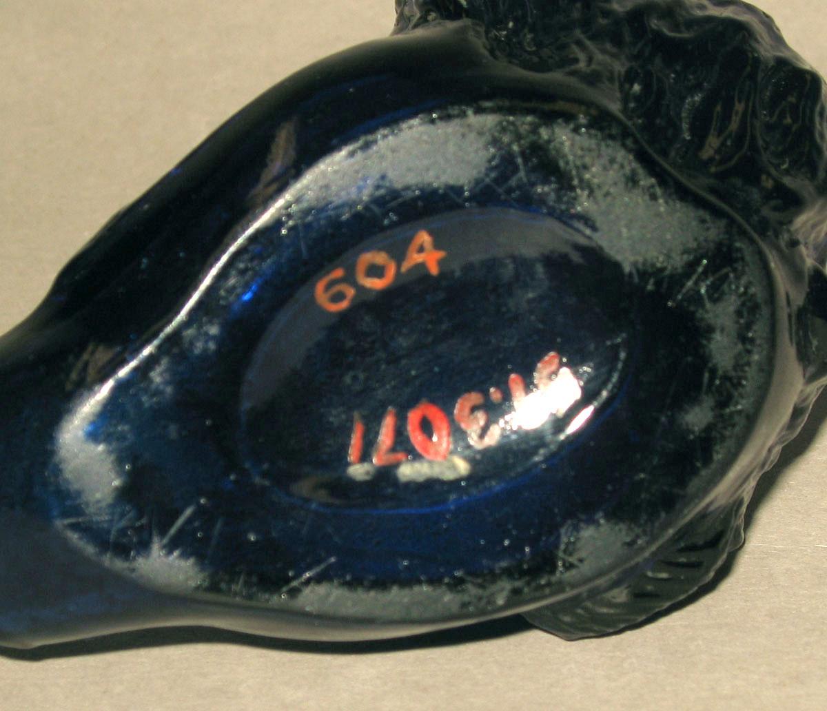 1959.3071 Glass inkwell (underside)