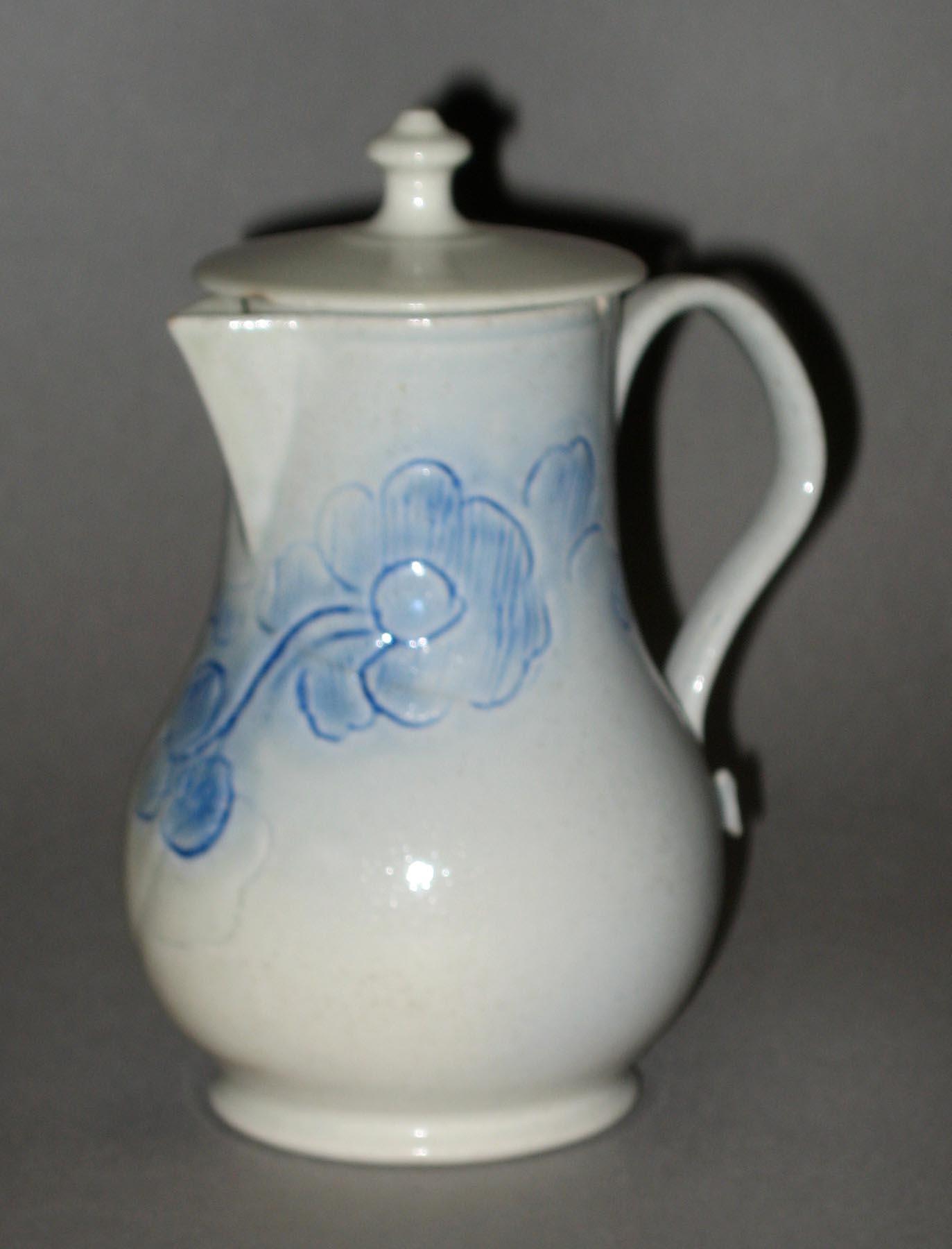 1958.0943 A, B Scratch blue milk jug