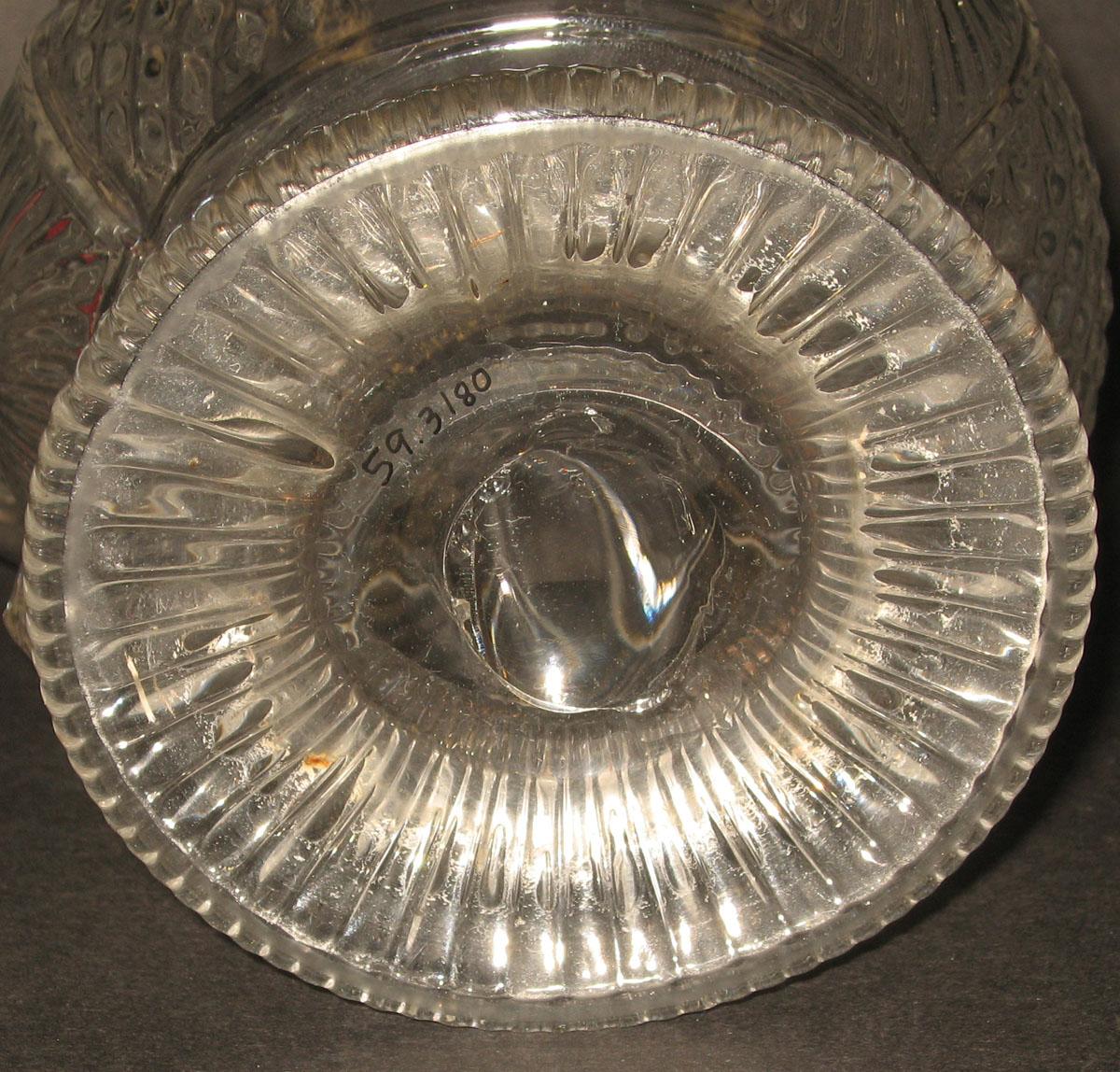 1959.3180 Glass jug (underside)
