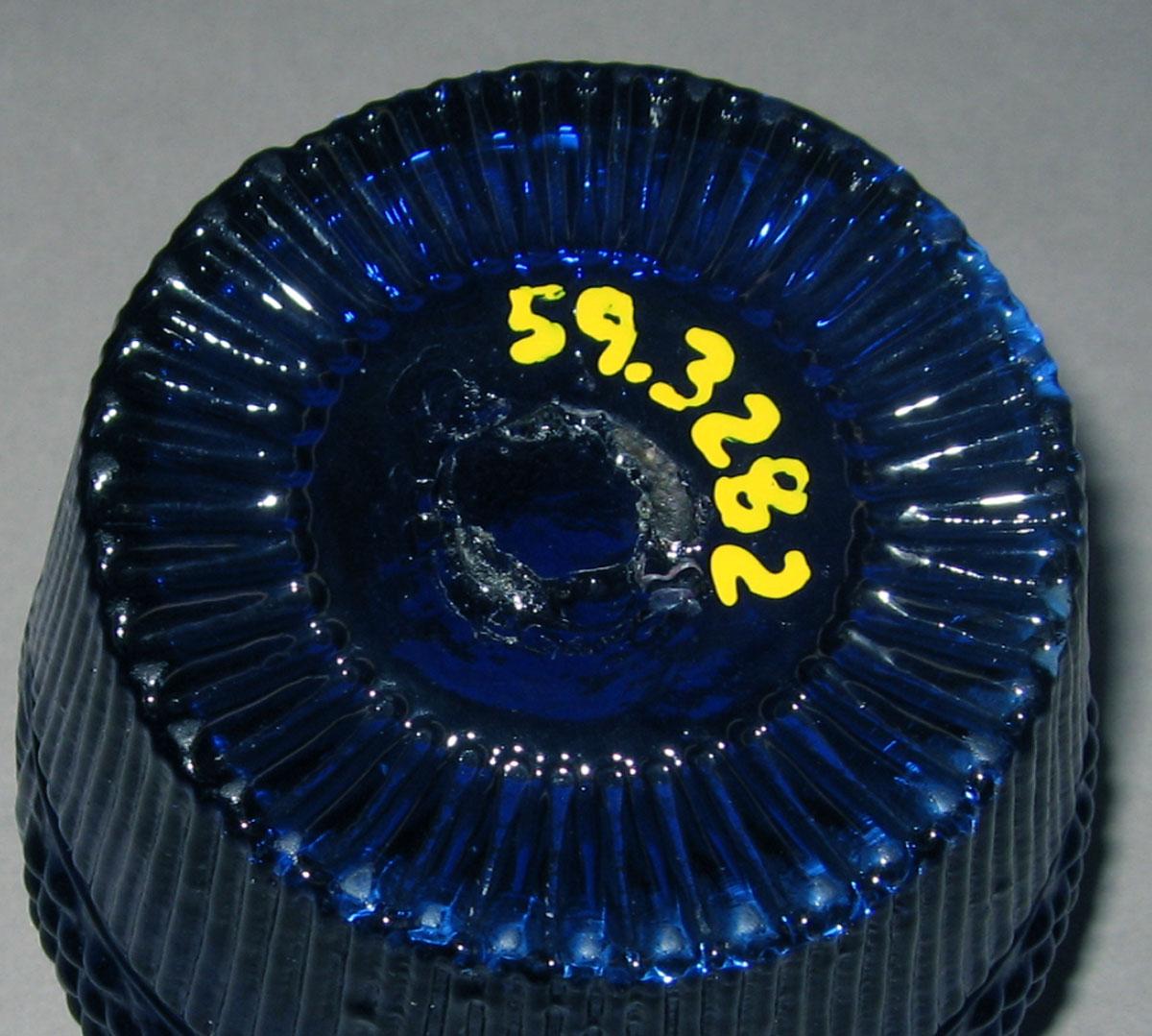 1959.3282 Blue glass tumbler (underside)