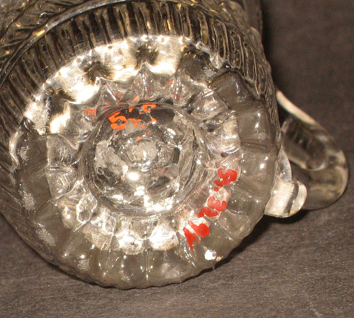 1959.3294 Glass jug (underside)