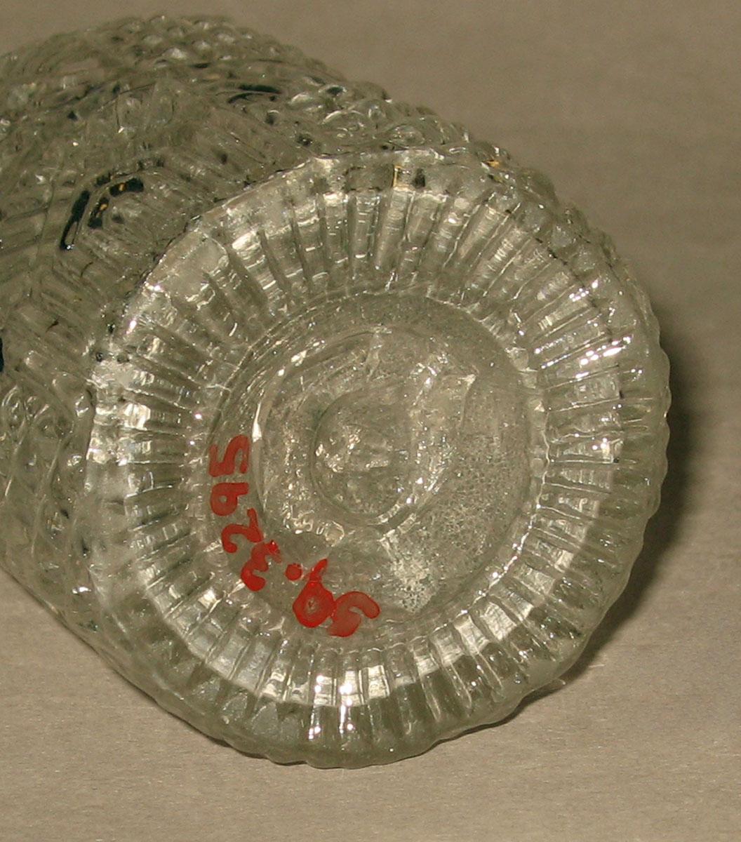 1959.3295 A Glass castor (undeside)