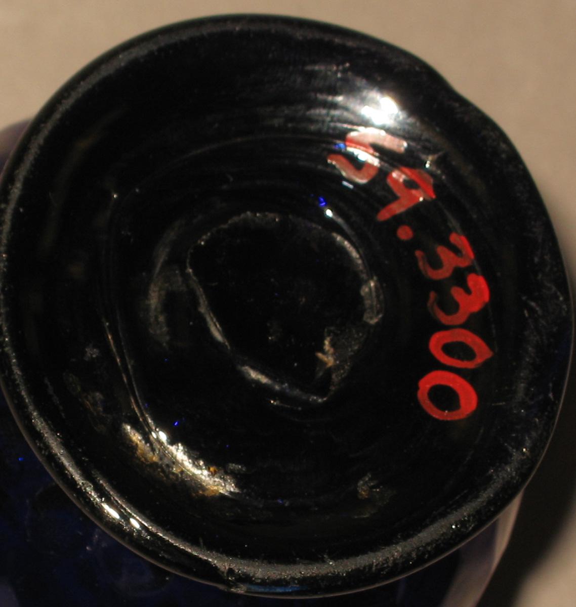 1959.3300 Blue glass jug (underside)