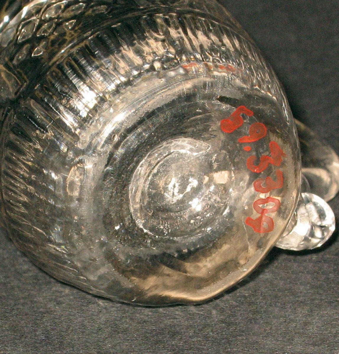 1959.3309 Glass jug (underside)