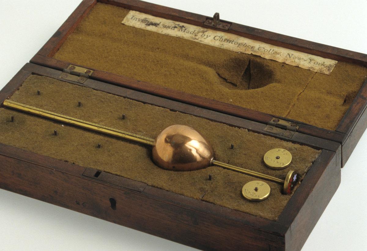 1959.3353 Hydrometer and case