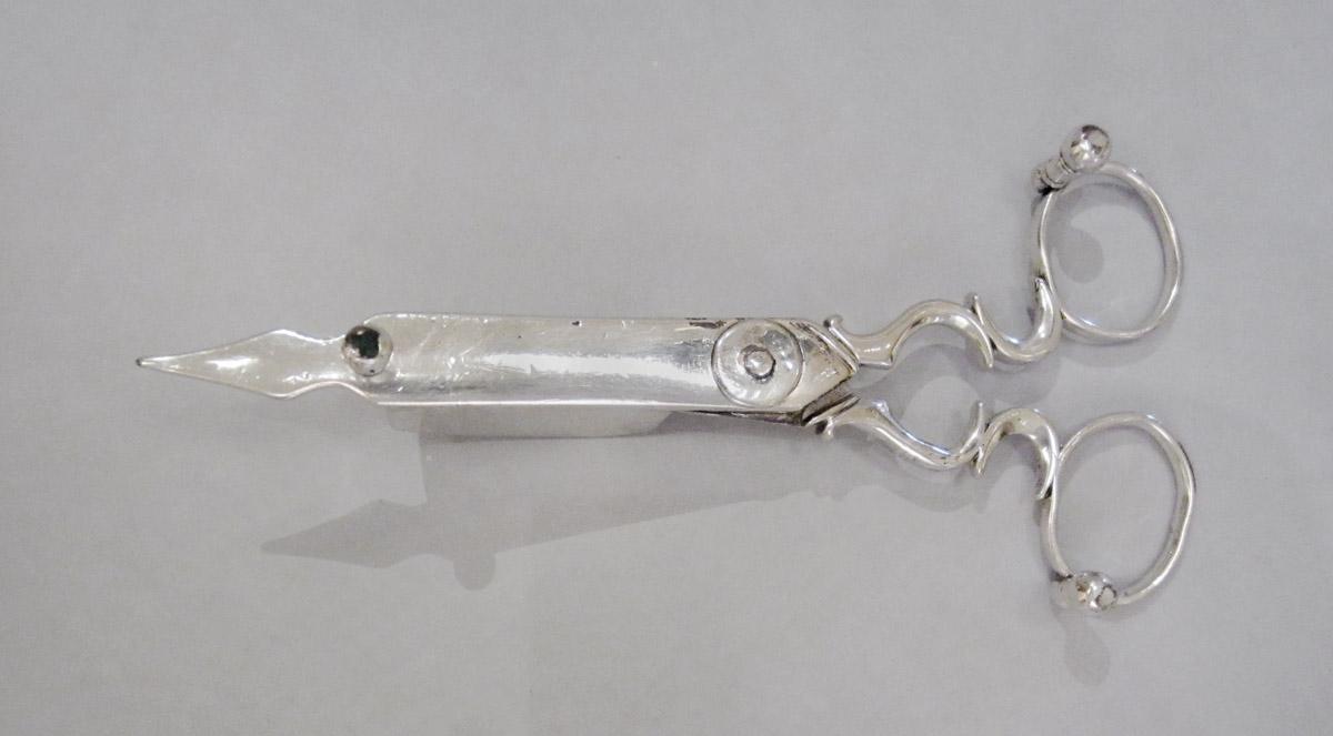 1959.3360 A Snuffer, underside