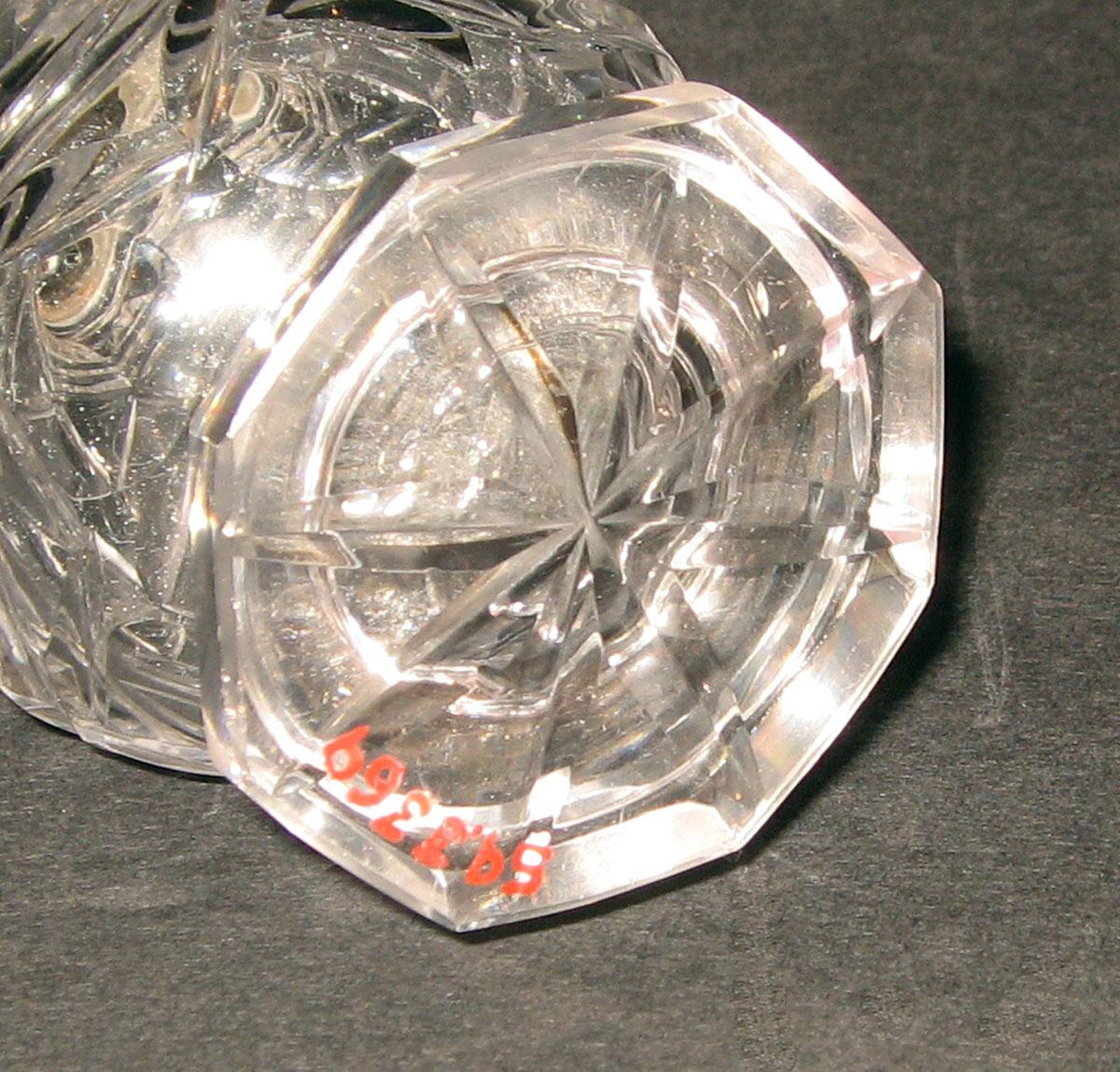 1959.3369 A Glass castor (underside)