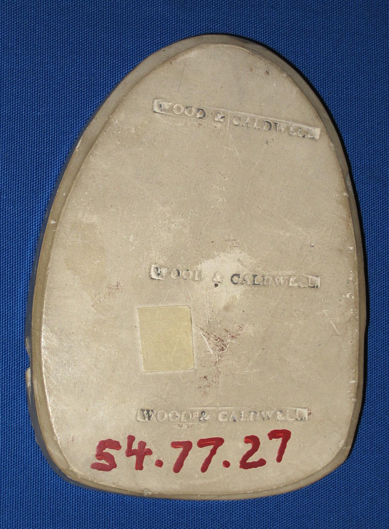 1954.0077.027 Sprig mold (back-mark)