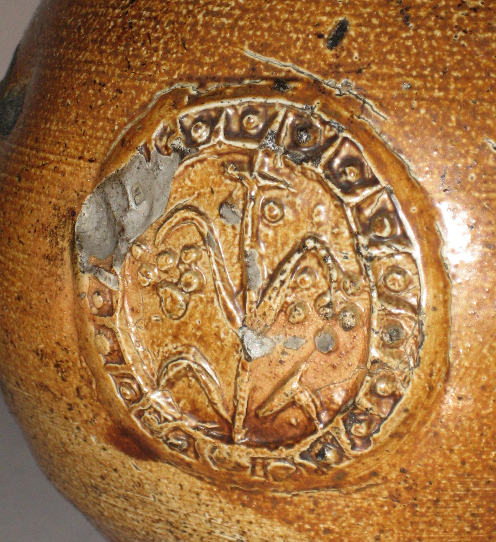 1960.0244 Stoneware bellarmine jug or bottle (seal)