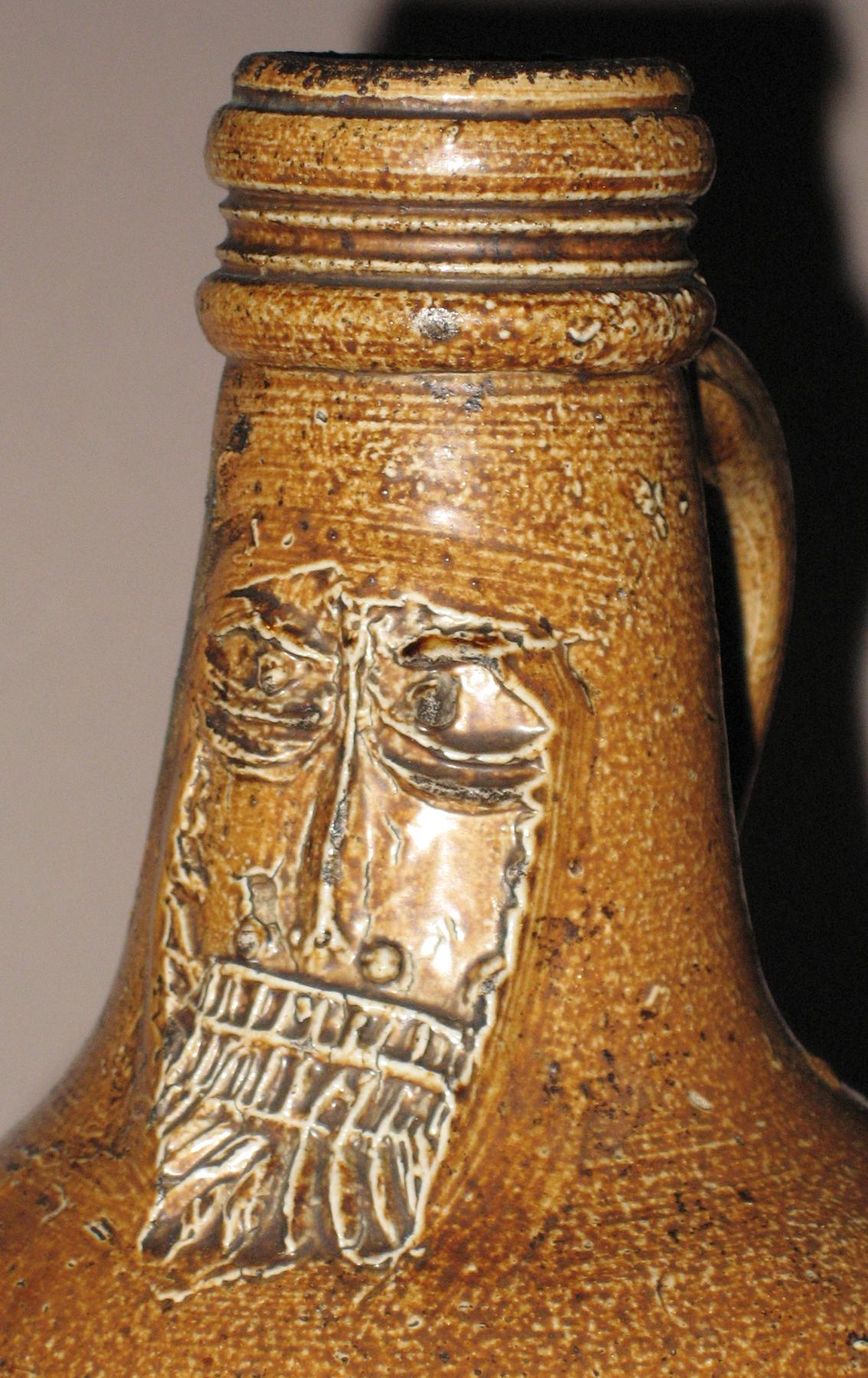 1960.0244 Stoneware bellarmine jug or bottle (mask)