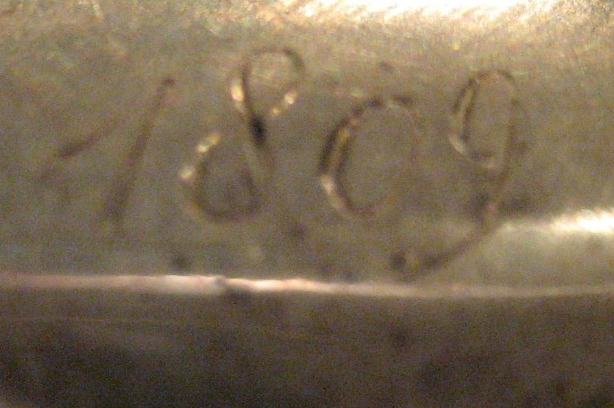 1954.0079.027 Knife (inscription)