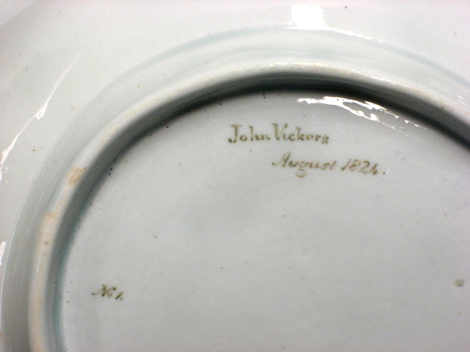 1960.0341.009 Dish (inscription).