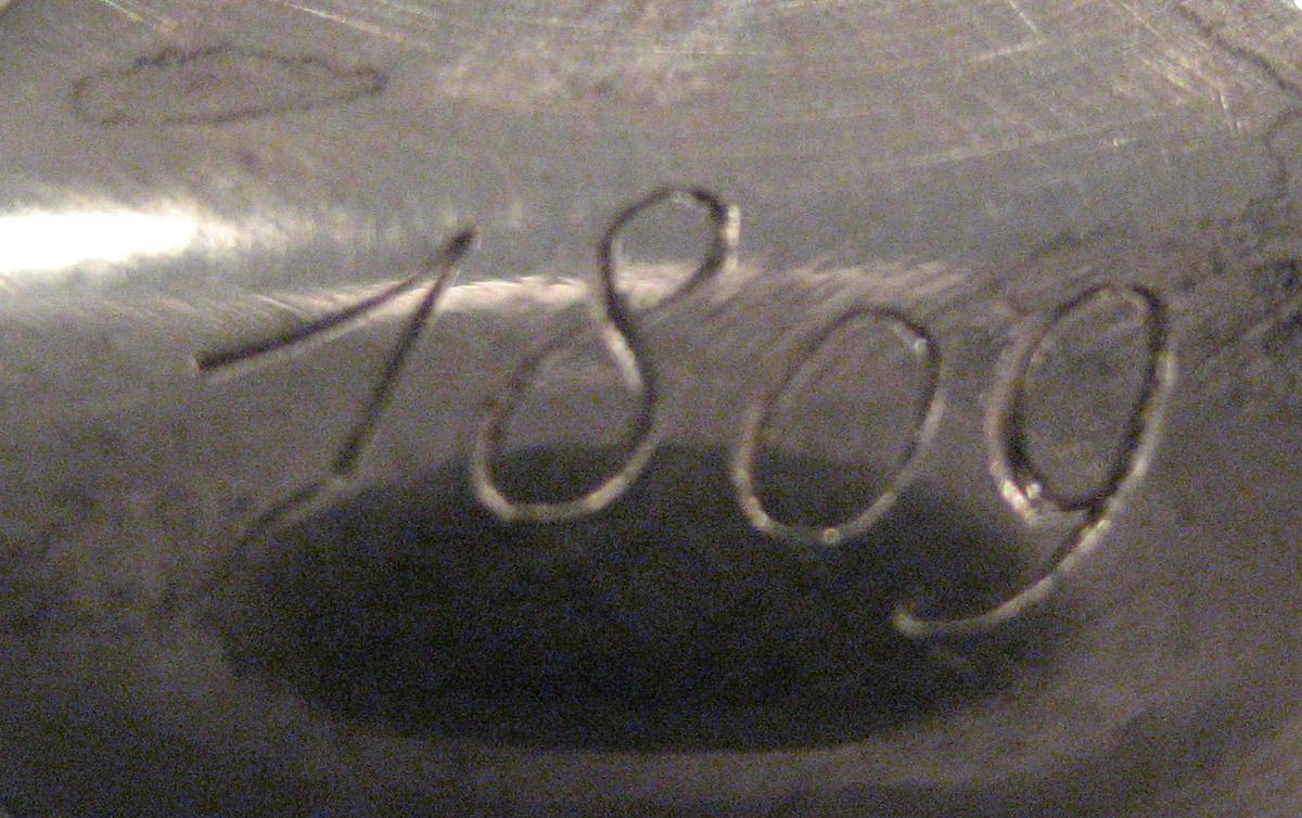 1954.0079.038 Knife (inscription)