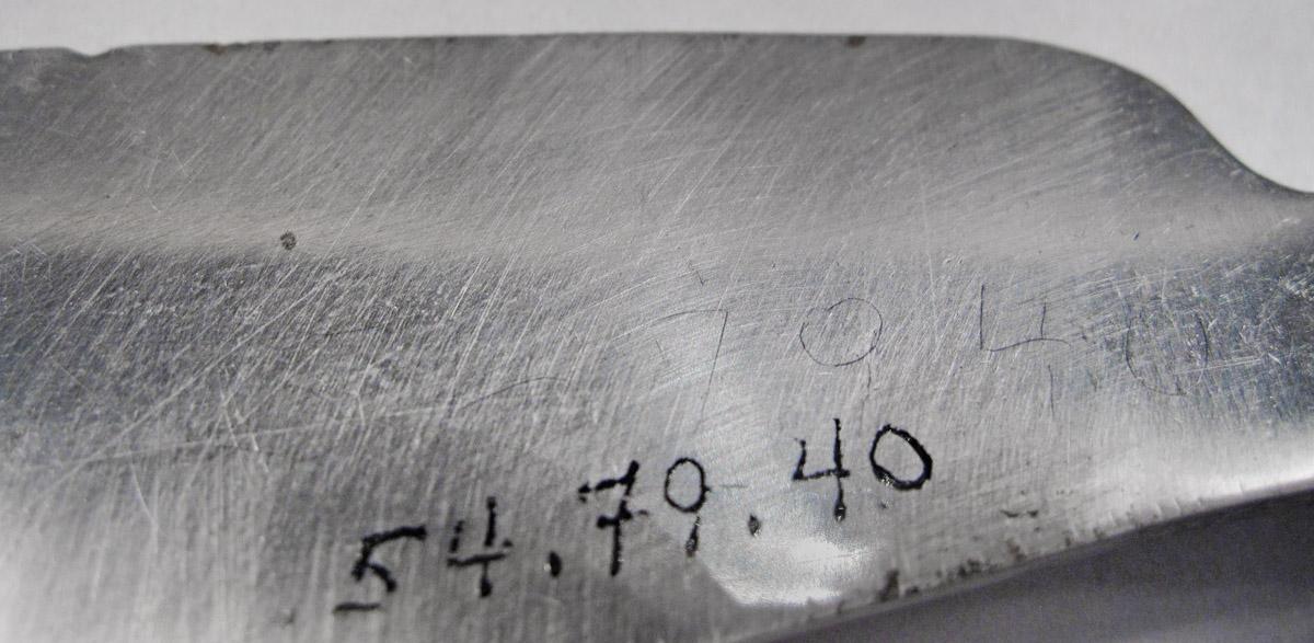1954.0079.040 Knife, inscription