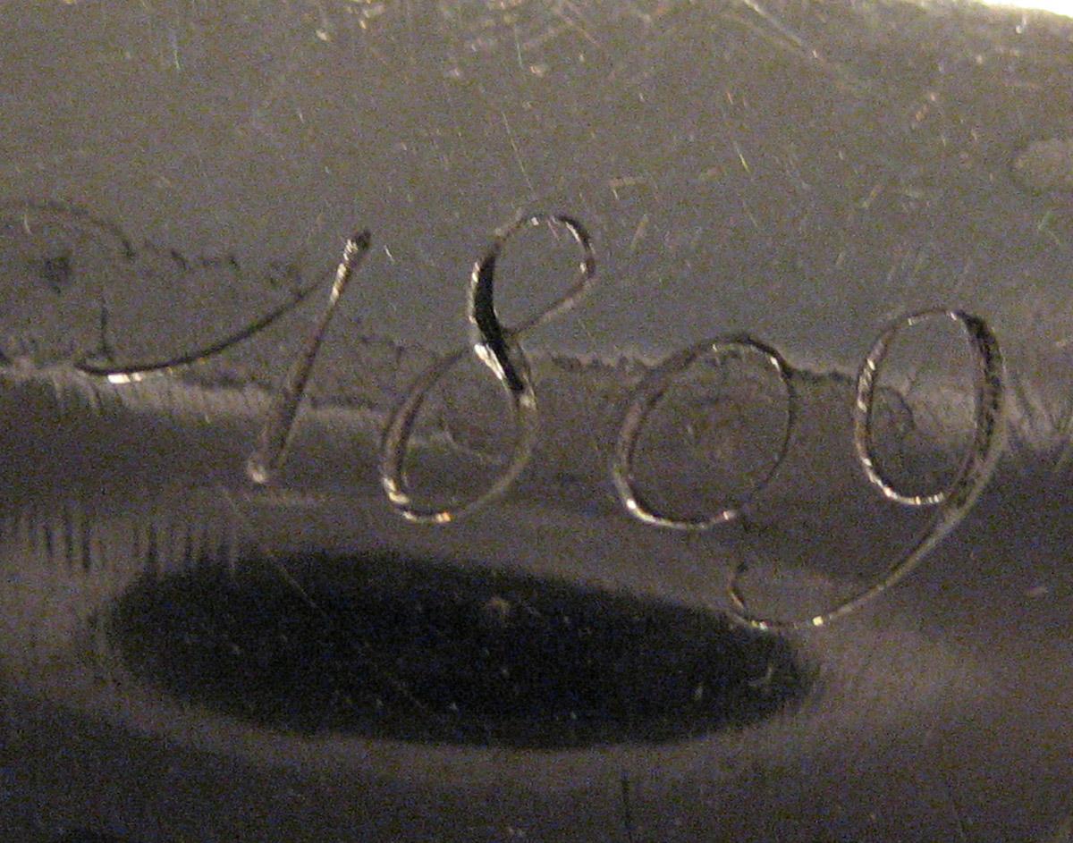 1954.0079.044 Knife (inscription)