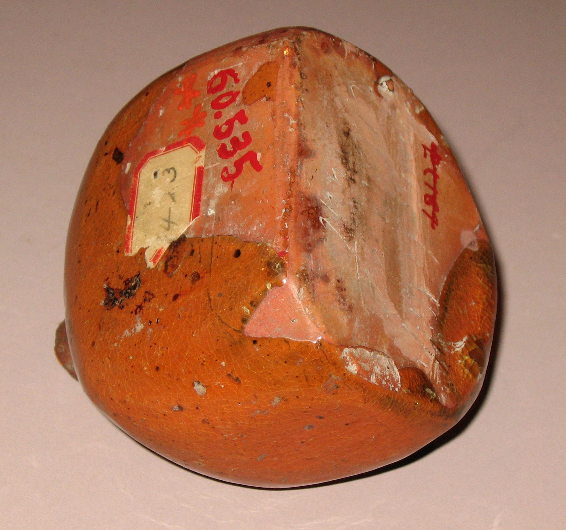 1960.0535 Redware slip cup or trailer (bottom-back)