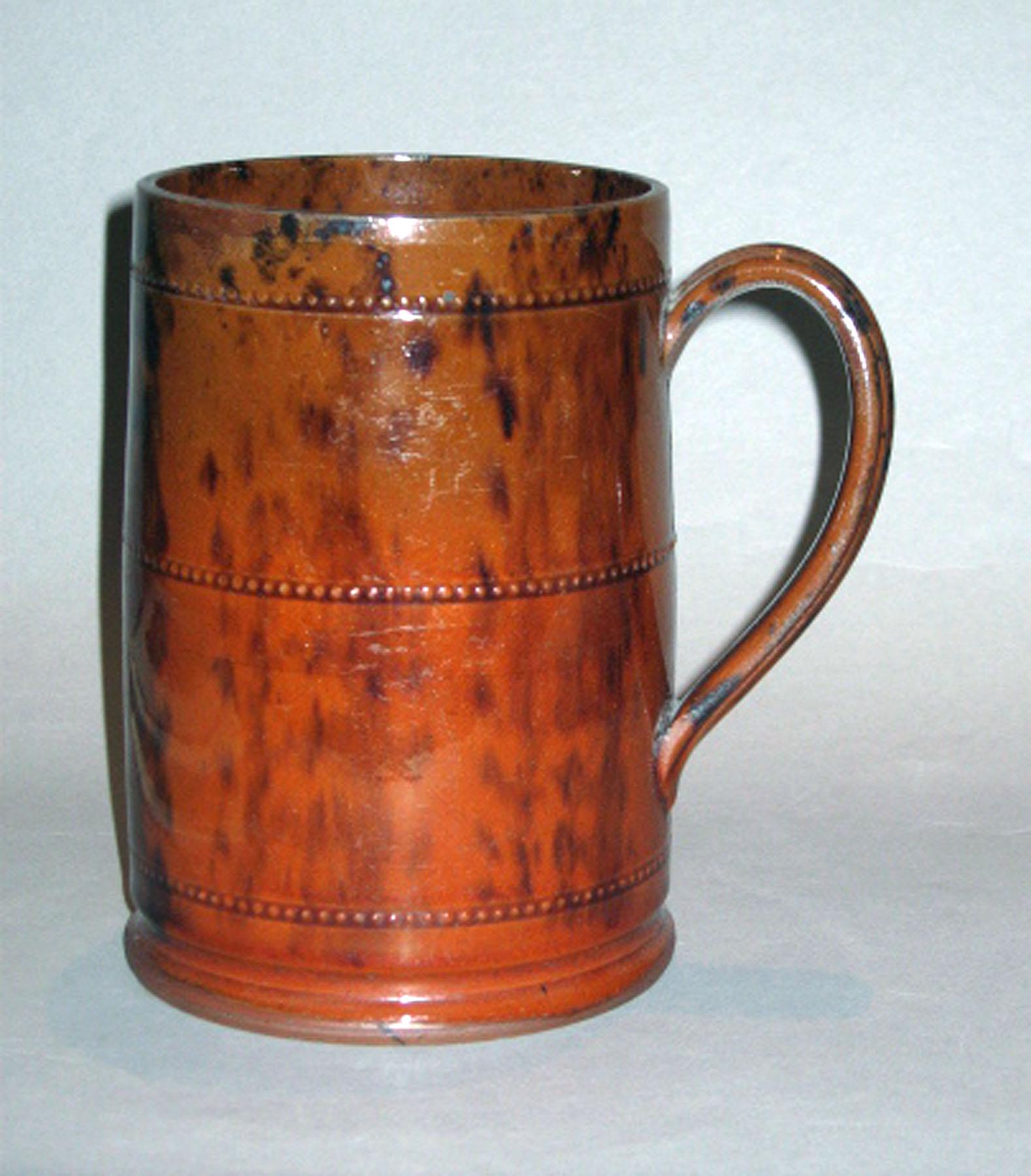 1960.0558 Redware mug