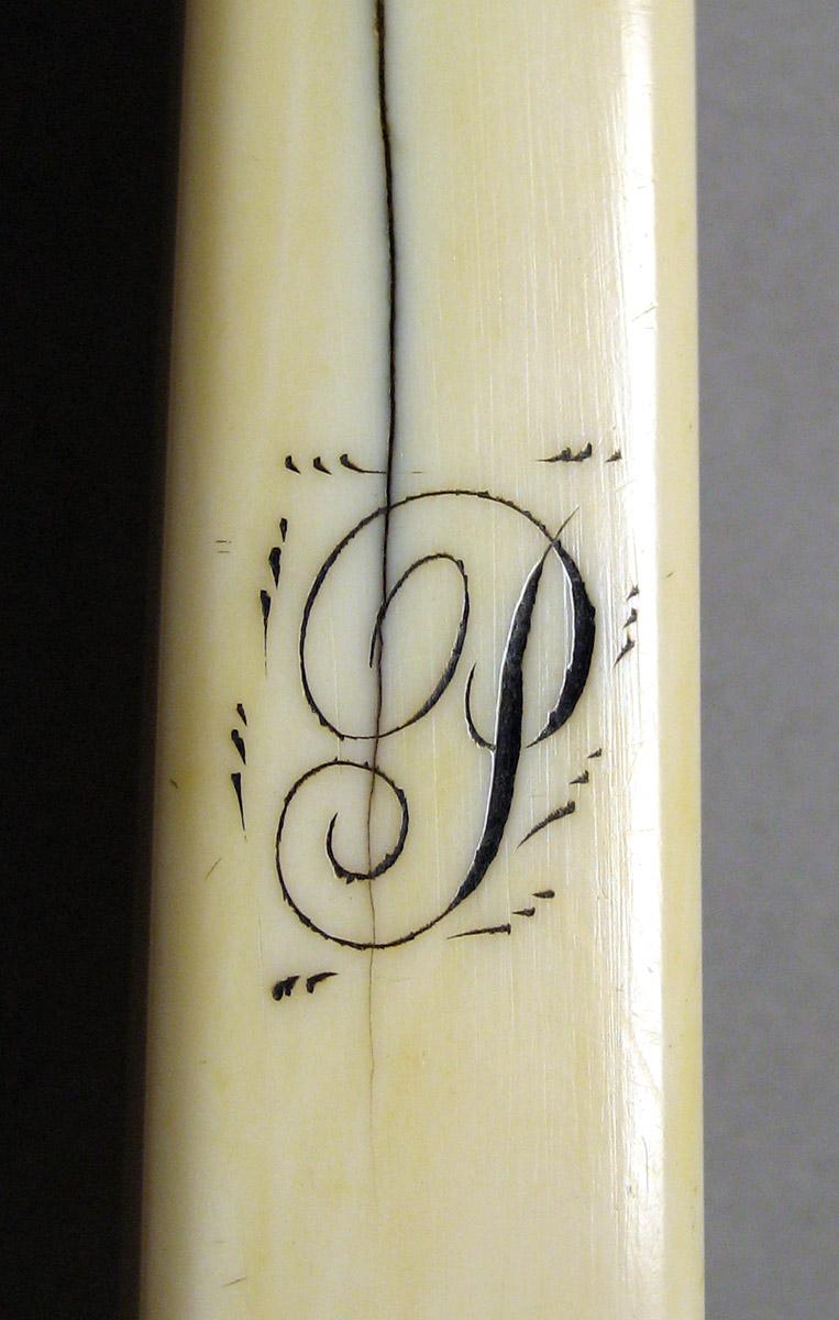 1954.0079.051 Silver and Ivory Server inscription