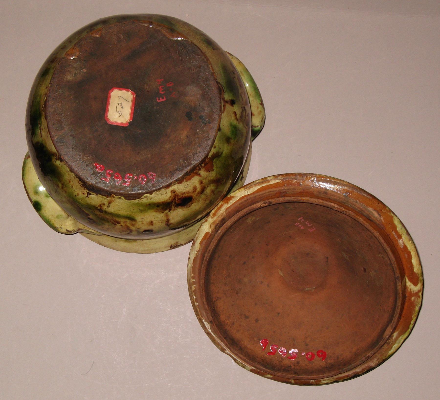 1960.0565 Slipware covered pot or jar (bottom and lid bottom)