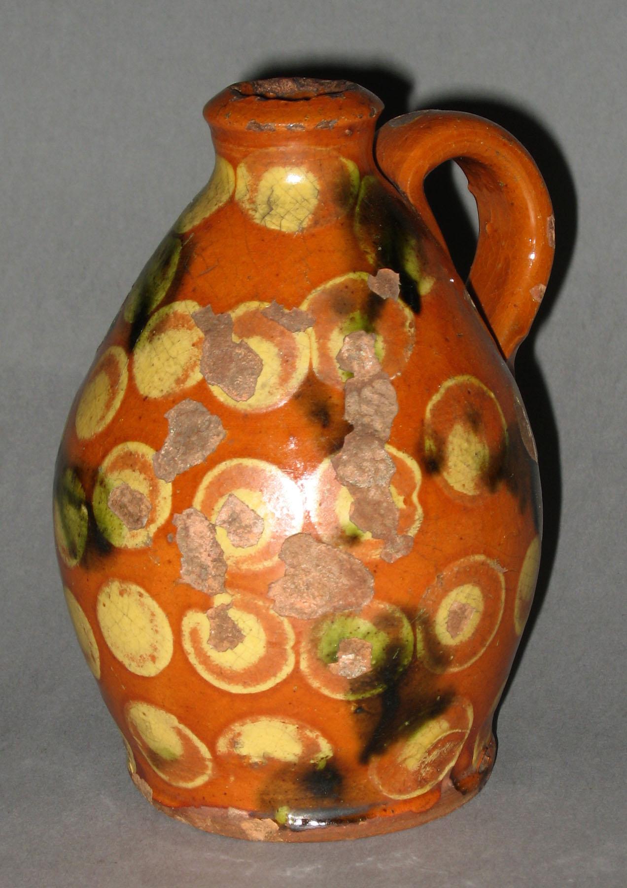 1960.0609 Dotted slip redware bottle