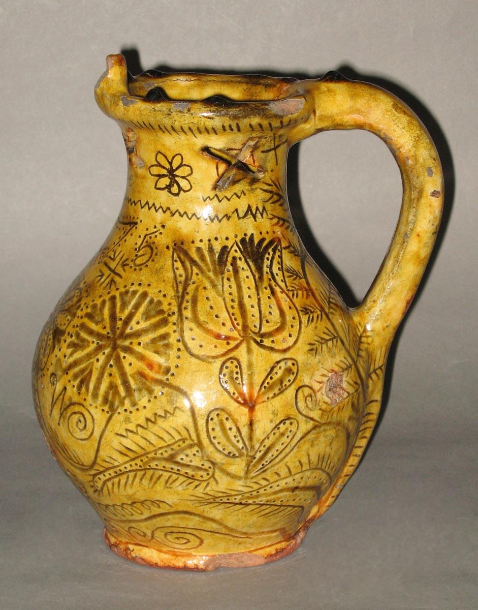 1960.0620 Slipware puzzle jug